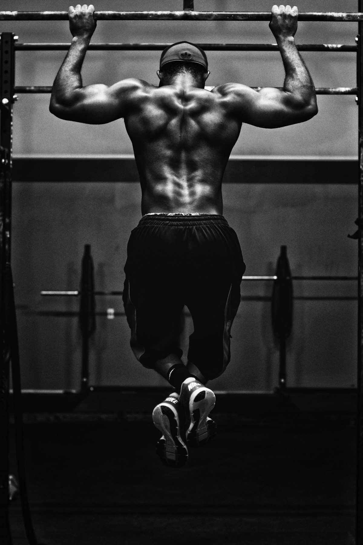 Loaded barbell representing progressive overload in strength training