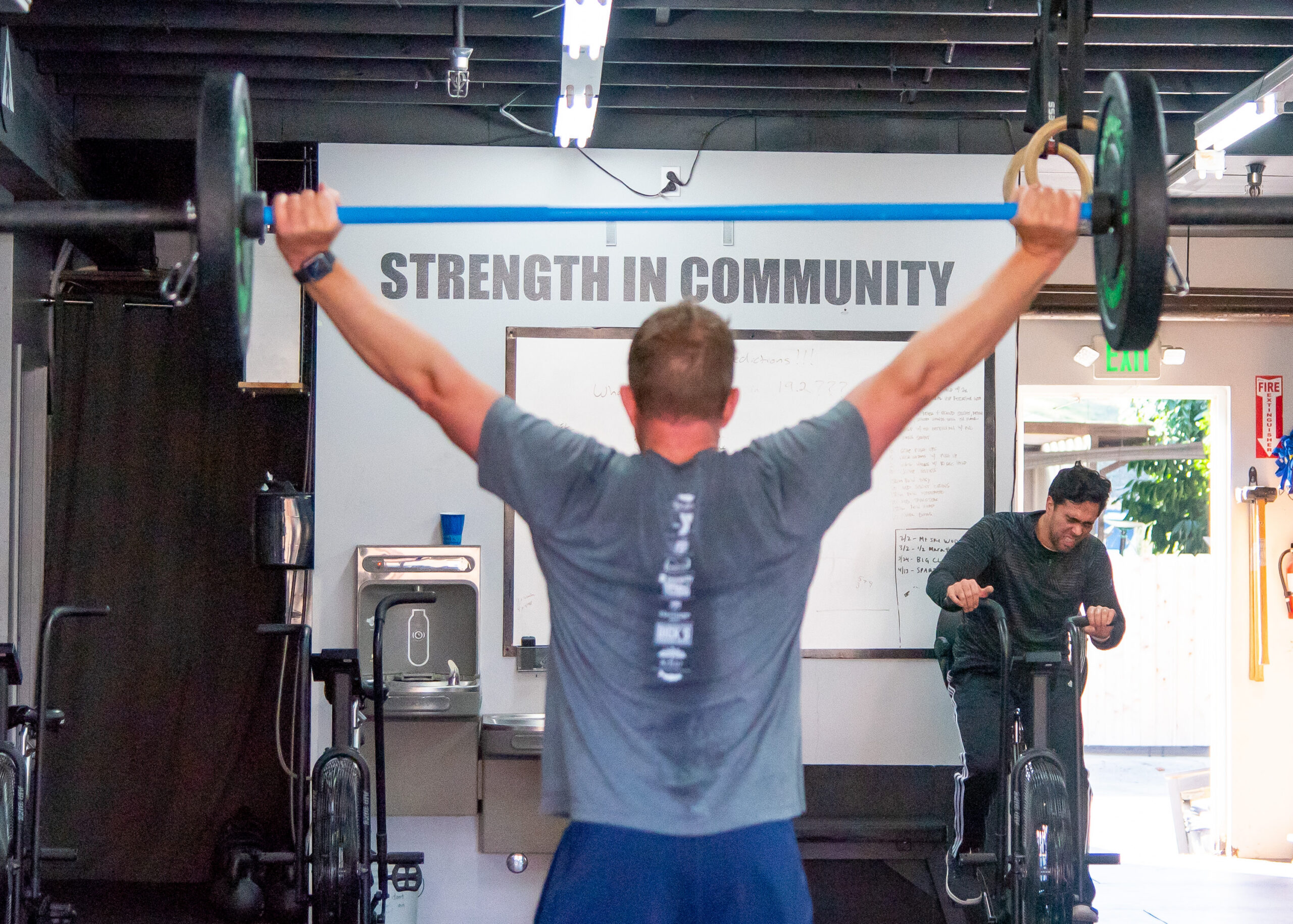Man in his 40s strength training with a barbell at Sasquatch Strength