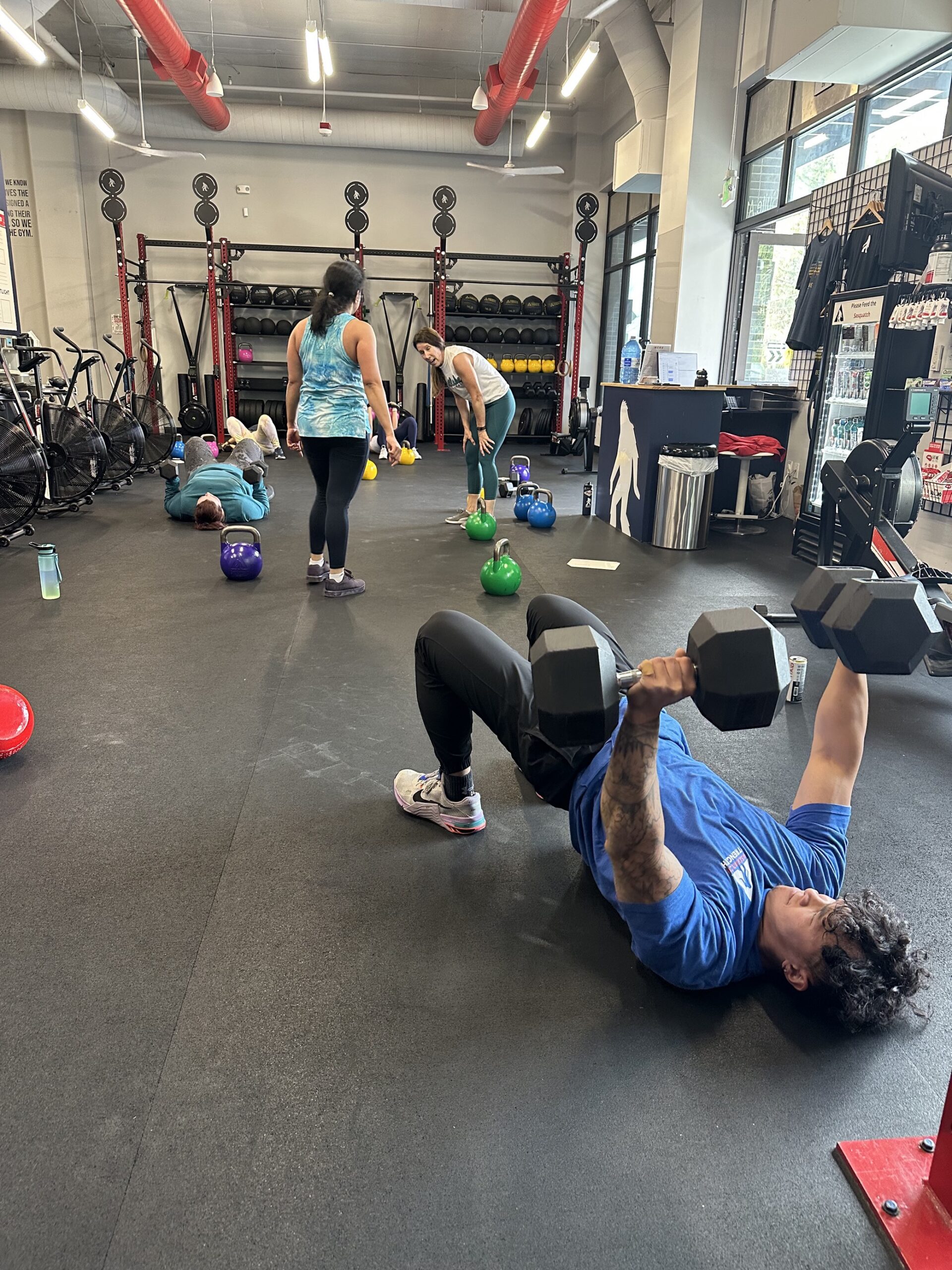 Adults strength training together to get strong for a milestone birthday